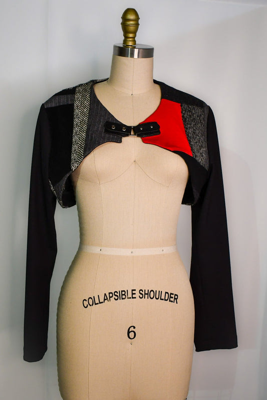 Cropped mix wool fabric, red Ponte  and black corduroy fabric. Black buckle faux leather closure. One-of-a-kind statement piece.